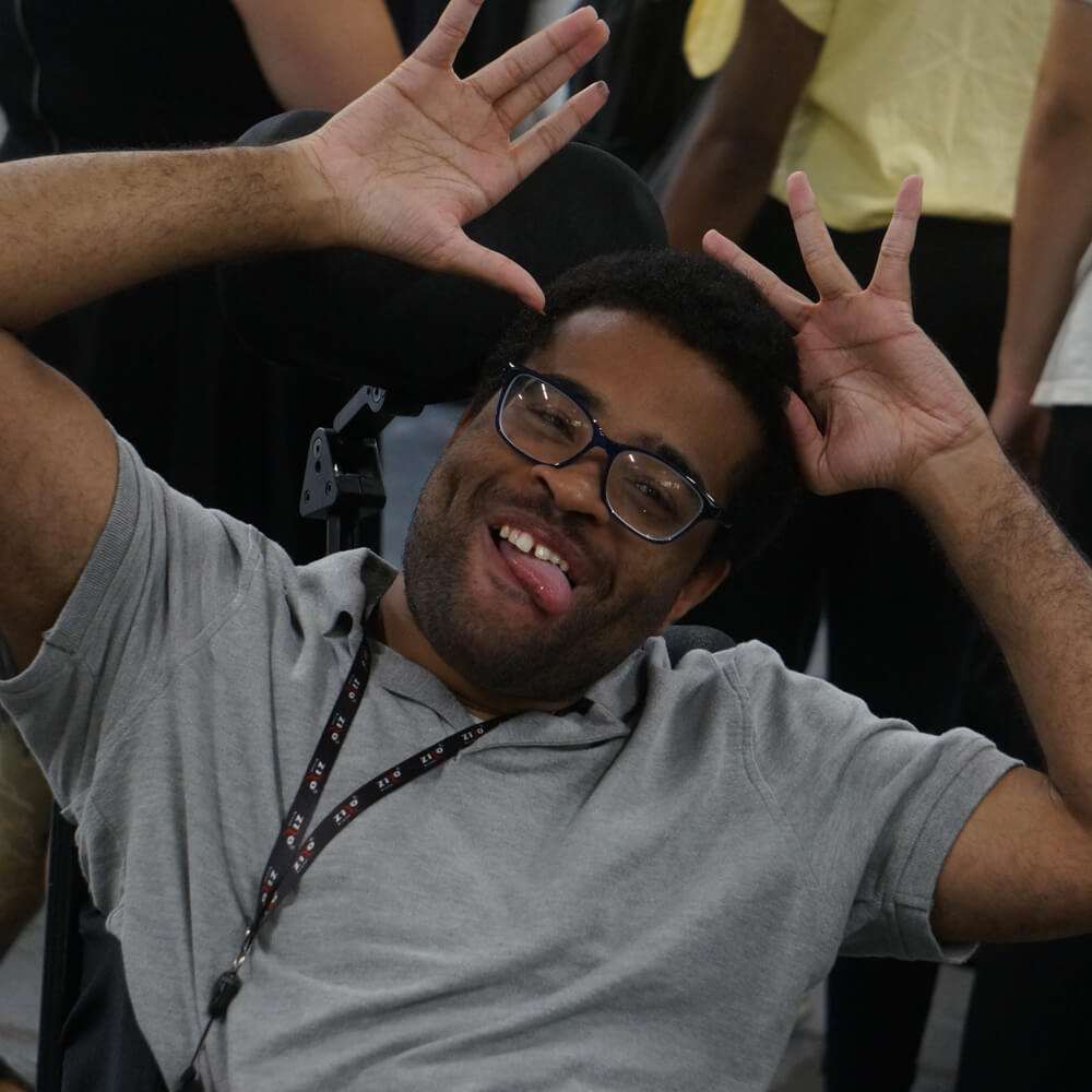 A PYD Mentee making a silly face for the camera