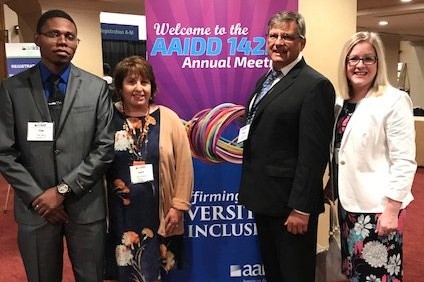 Tim Davis and John Waterman of PEAC, Judy Shanley of Easterseals, and Genelle Thomas of PYD