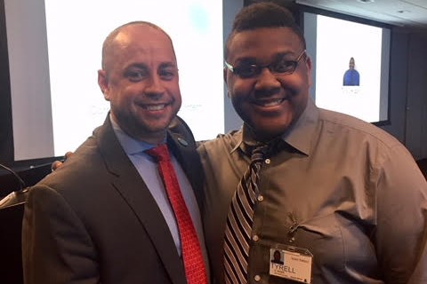 TK standing with his supervisor at State Street