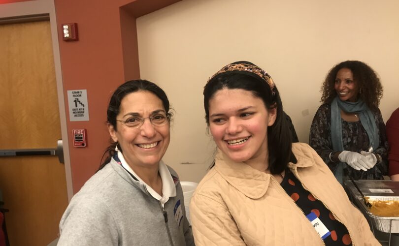 Lisa and Tatiana smiling for a photo together