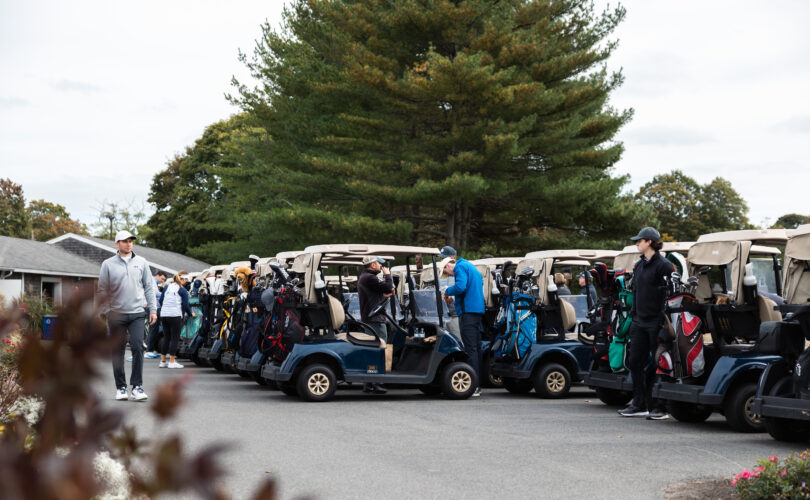 Golfers in golf carts