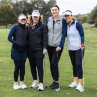 Golfers posed together