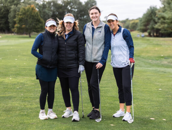 Golfers posed together
