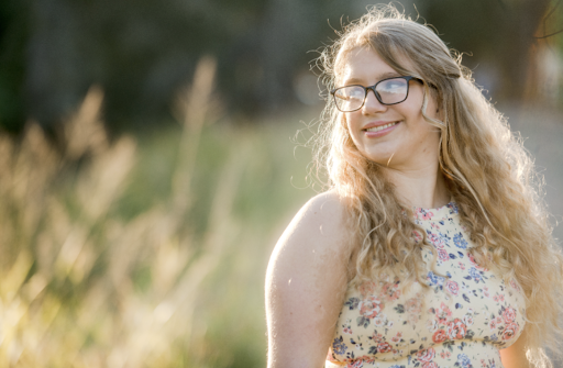 Headshot of Kaley Delker (She/Her/Hers)